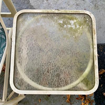 LOT 129 O: Large Outdoor Green Leaf Motif Patio Set: Glass Top Table w/ 6 Chairs, 2 Glass Top Side Tables w/ Glider, Lounger, & Ottoman