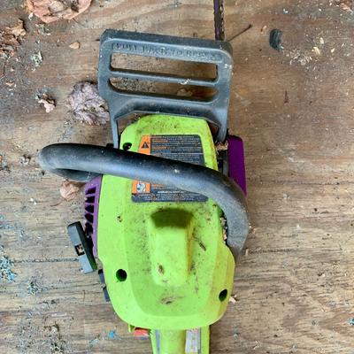 LOT 135 S: Poulan Wild Thing 18" Weed Eater Gas Powered Chainsaw Model # P4018WT 952802036 & NIP Forester Chainsaw Safety Chaps...