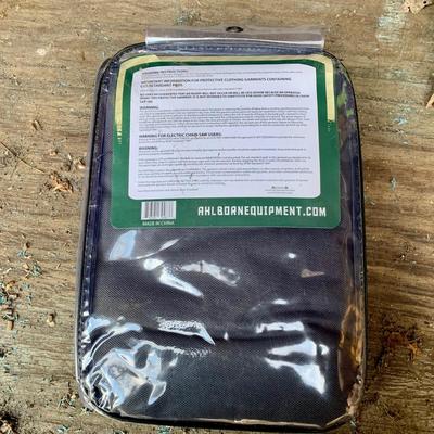 LOT 135 S: Poulan Wild Thing 18" Weed Eater Gas Powered Chainsaw Model # P4018WT 952802036 & NIP Forester Chainsaw Safety Chaps...