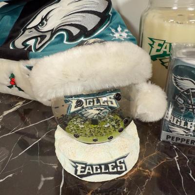 LOT 174D: Eagles Christmas Collection - White 42” Tree w/ Football Or aments, Snowglobe, Santa Hat & More