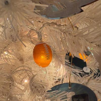 LOT 174D: Eagles Christmas Collection - White 42” Tree w/ Football Or aments, Snowglobe, Santa Hat & More