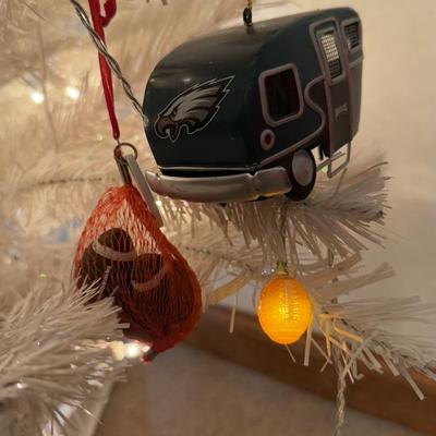 LOT 174D: Eagles Christmas Collection - White 42” Tree w/ Football Or aments, Snowglobe, Santa Hat & More