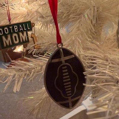 LOT 174D: Eagles Christmas Collection - White 42” Tree w/ Football Or aments, Snowglobe, Santa Hat & More