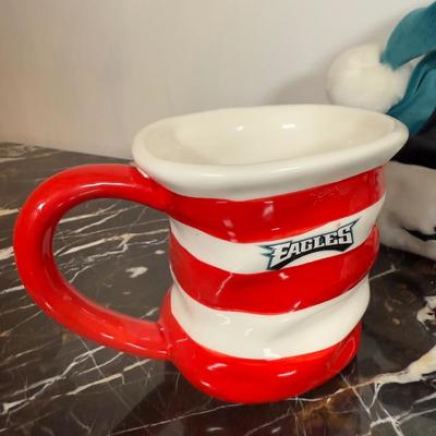 LOT 174D: Eagles Christmas Collection - White 42” Tree w/ Football Or aments, Snowglobe, Santa Hat & More