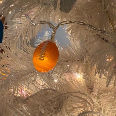 LOT 174D: Eagles Christmas Collection - White 42” Tree w/ Football Or aments, Snowglobe, Santa Hat & More