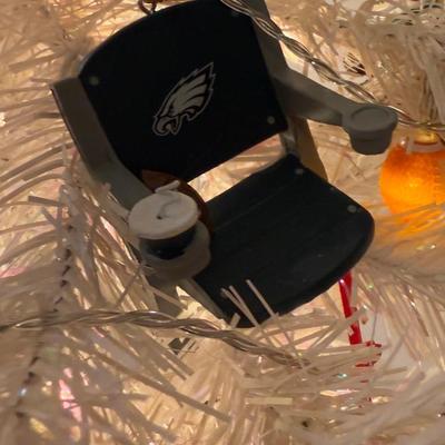 LOT 174D: Eagles Christmas Collection - White 42” Tree w/ Football Or aments, Snowglobe, Santa Hat & More