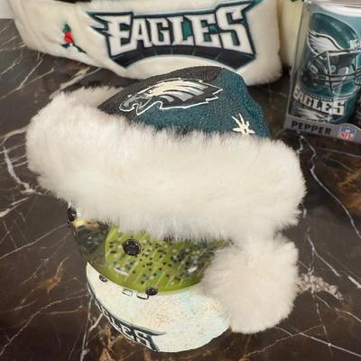 LOT 174D: Eagles Christmas Collection - White 42” Tree w/ Football Or aments, Snowglobe, Santa Hat & More