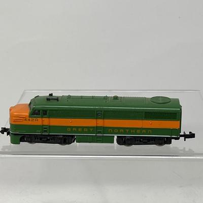 17 N Gauge Train Cars & One Engine