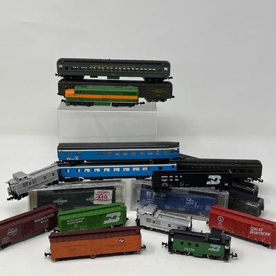 17 N Gauge Train Cars & One Engine