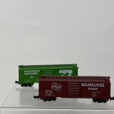 17 N Gauge Train Cars & One Engine
