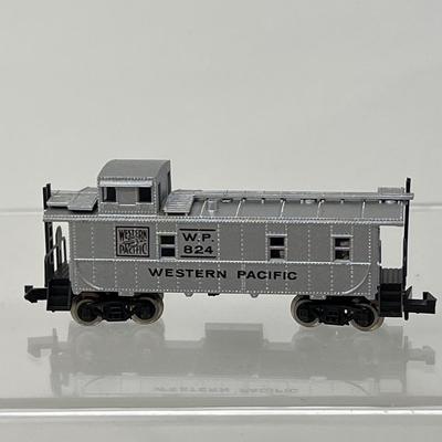 17 N Gauge Train Cars & One Engine