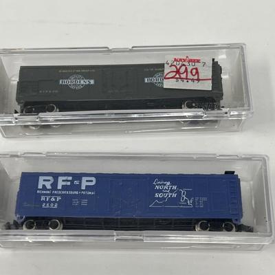 17 N Gauge Train Cars & One Engine