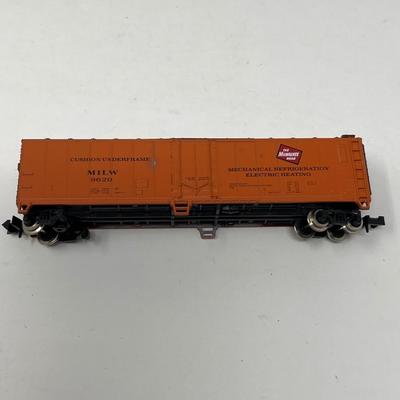 17 N Gauge Train Cars & One Engine