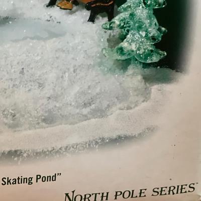 RARE Department 56 North Pole Series Animated & Lighted Skating Pond
