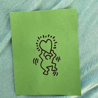 Keith Haring Drawing on Green Paper