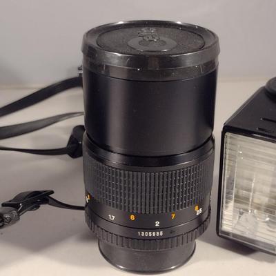 Minolta XG7 Camera with Celtic 135 mm 1:2.8 Lens, Auto 320 X Flash, and Carry Case
