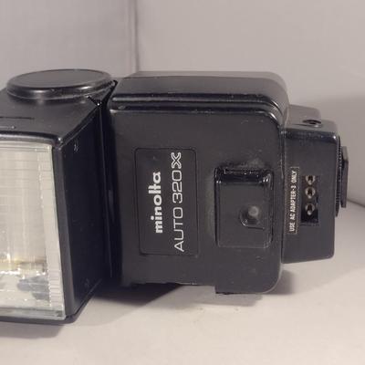 Minolta XG7 Camera with Celtic 135 mm 1:2.8 Lens, Auto 320 X Flash, and Carry Case