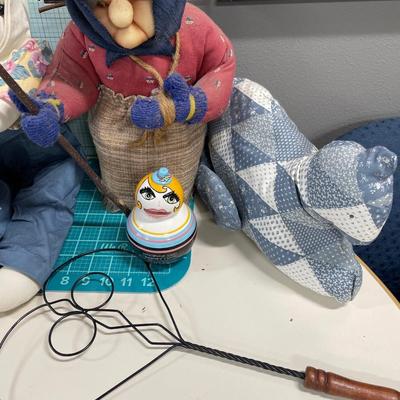 Stuffed rabbits, old lady and cat