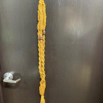 5 orange/gold macramé plant holders
