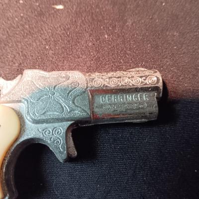 FRONTIER FIREARMS AND HUBLEY DERRINGER CAP GUNS