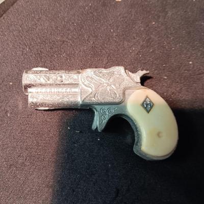 FRONTIER FIREARMS AND HUBLEY DERRINGER CAP GUNS