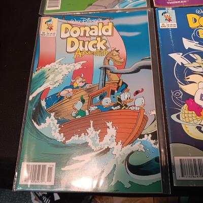 3 DONALD DUCK AND 1 CRACKY COMIC BOOKS