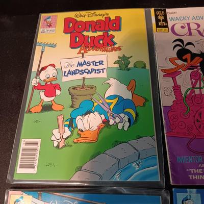 3 DONALD DUCK AND 1 CRACKY COMIC BOOKS