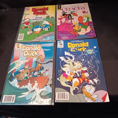 3 DONALD DUCK AND 1 CRACKY COMIC BOOKS