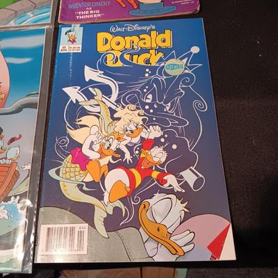 3 DONALD DUCK AND 1 CRACKY COMIC BOOKS