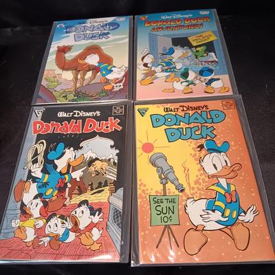 4 DONALD DUCK COMIC BOOKS