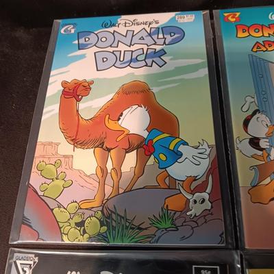4 DONALD DUCK COMIC BOOKS