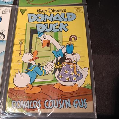 4 DONALD DUCK COMIC BOOKS