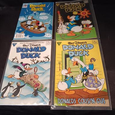 4 DONALD DUCK COMIC BOOKS