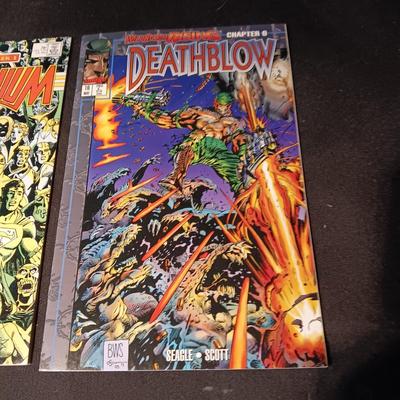 MILLENNIUM AND DEATHBLOW COMIC BOOKS (INCLUDES A PACK OF TRADING CARDS)
