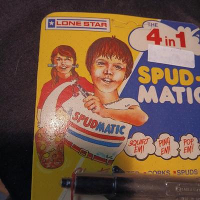 UNOPENED DIE-CAST SPUD-MATIC ON BOARD
