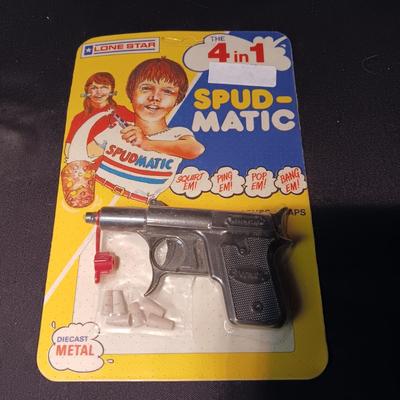 UNOPENED DIE-CAST SPUD-MATIC ON BOARD