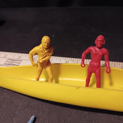 INDIANS AND CANOE TOY