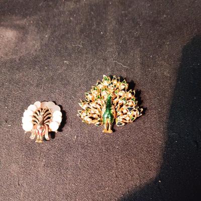 2 PEACOCK BROOCHES