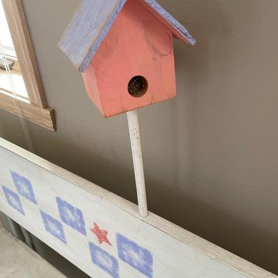 Bench with birdhouse and semi circle table