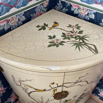 Painted bird corner cabinet