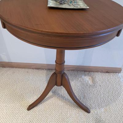 Roundwood and table with floral candleholders and more