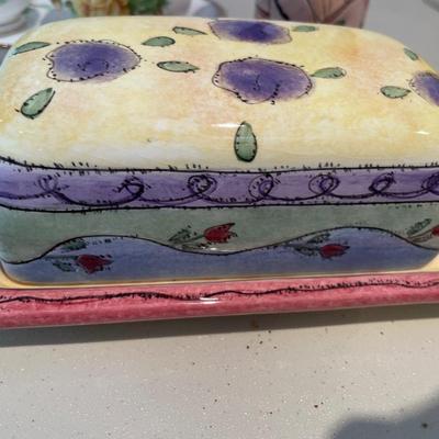 Yellow floral decor with butter dish and small Susan Pauley vase