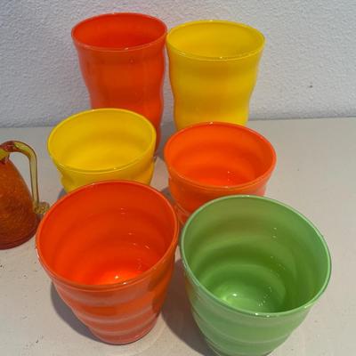 Yellow and orange glasses and decor