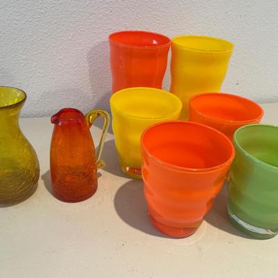 Yellow and orange glasses and decor
