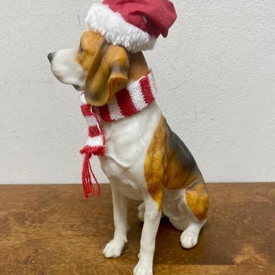Beagle Dog Dressed In Santa Hat And Scarf