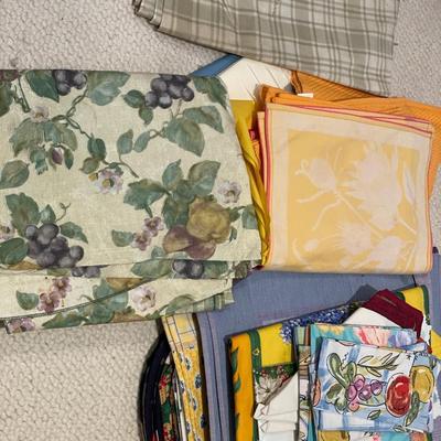 Large group of placemats and table clothes