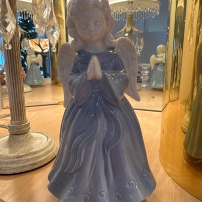 Angel decor with candle holders and lamp