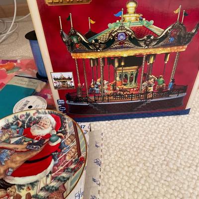 Lemax carousel collectible, wrapping paper and decorative plate