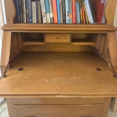 Vintage drop-down desk with books