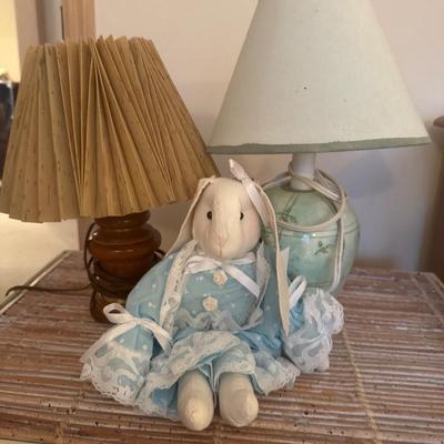 Metal wicker hamper with lamps and bunny.